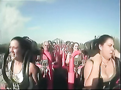 Big tits pop out on roller coaster cam