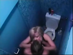 Beautiful blonde babe delivers a blowjob in the restroom