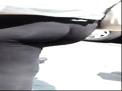Sporty ass in spandex on busy city streets